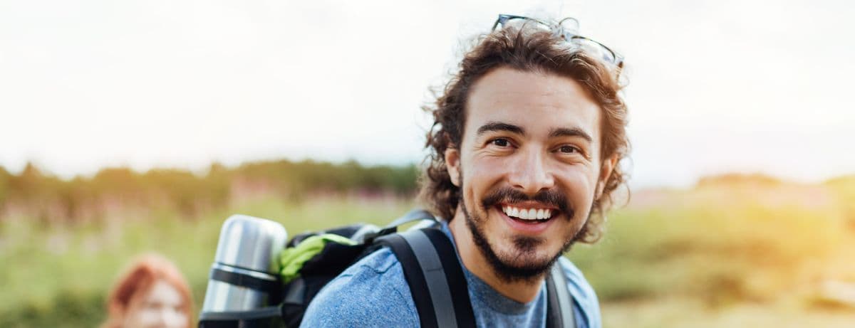man in blue hiking